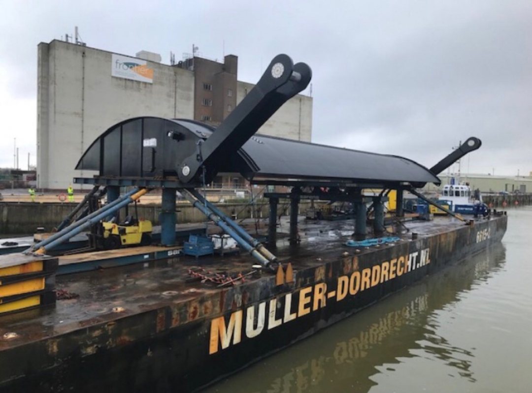 Arrival of vertical lift gate at Boston flood barrier on barge