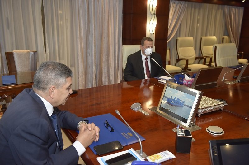 Admiral Osama Rabie of Suez Canal Authority watching launch Mohab Mameesh dredger on video