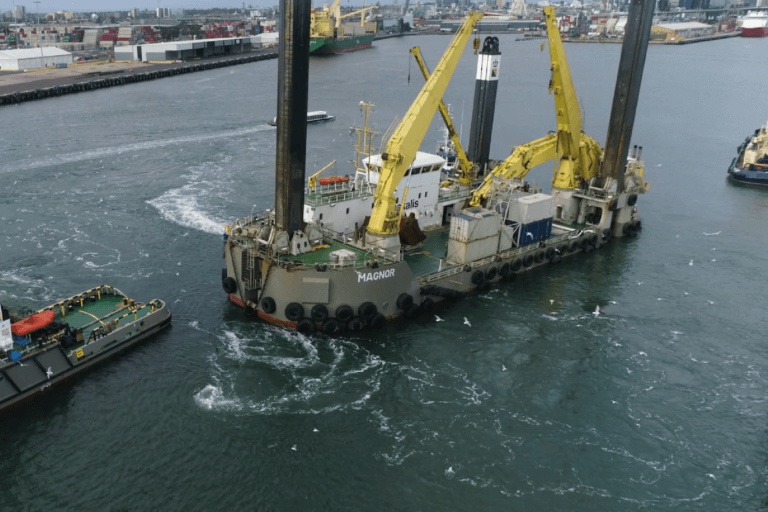 Boskalis backhoe dredger Magnor at work in port of melbourne, Australia