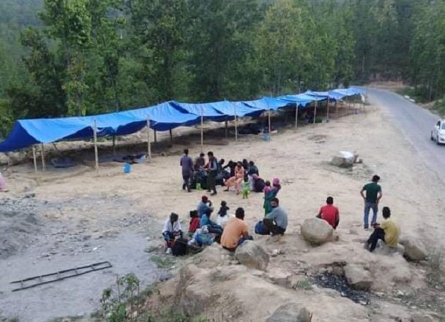 Provincial checkpoint for returning migrant workers from India in Birendranagar, Nepal