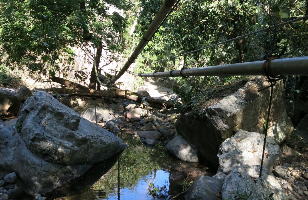 Water pipes that cross a river in San Antonio de Cortes, Honduras