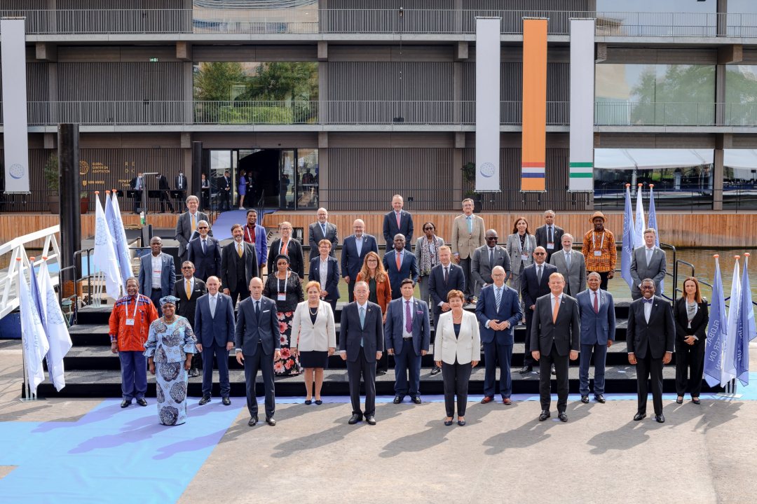 Global leaders in front of the new floating office of the Global Centre on adaptation