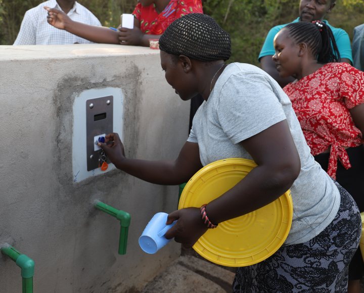 Female at a water ATM placed in Siaya County, Kenya. Photo: Dorcas