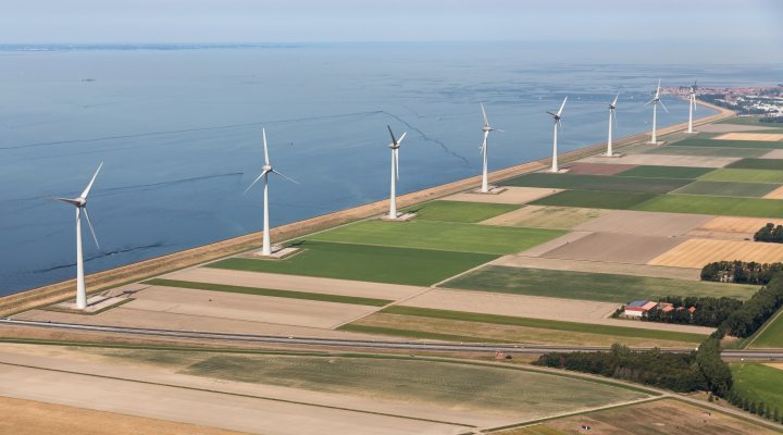 Dutch polder landscape with modern windmills