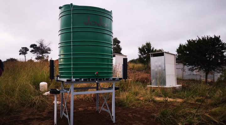 Water tank to serve as handwashing facility
