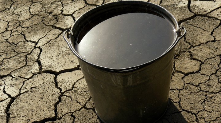 Bucket of water on dry soil - Stockholm World Water Week