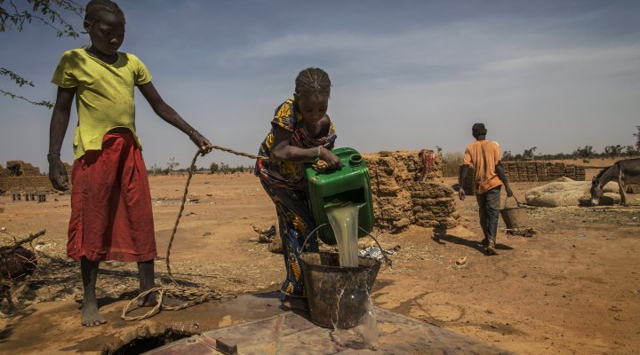 Fetching water from a pumping station.