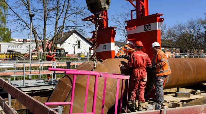 Pipe crossing to lift large water flow over construction site. Oberhausen, Germany