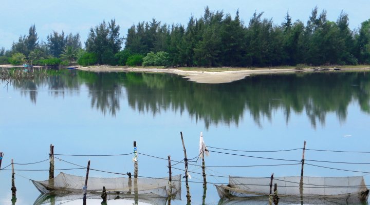 Fish ponds in a river in Vietnam