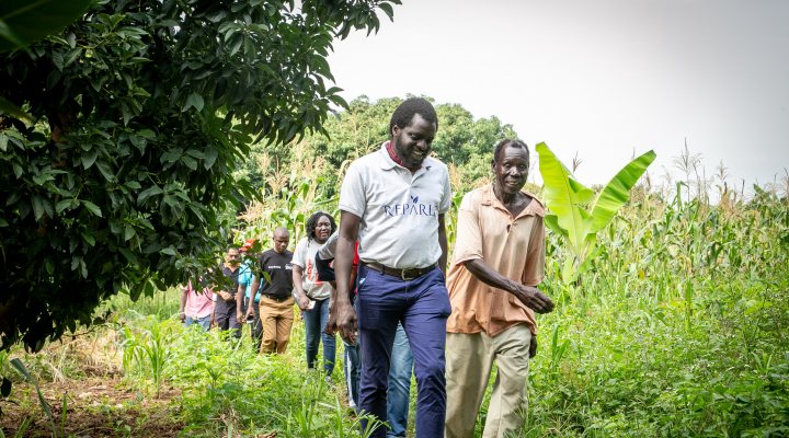 Kenyan entrepreneur Peter Nyeko with small hold farmers