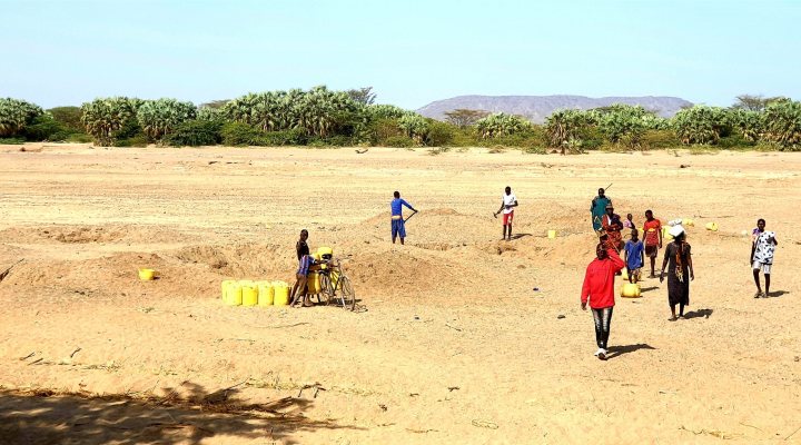 Residents in Turkana, Kenya are digging shallow wells for drinking water in a dry riverbed.