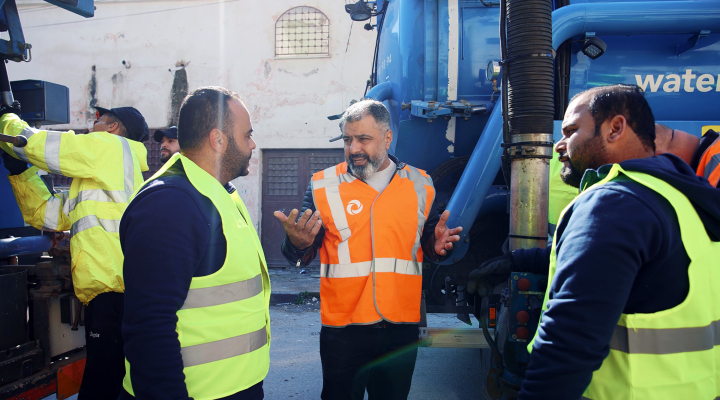 Employees of World Waternet and Yarmouk Water Company talking. Photo: World Waternet