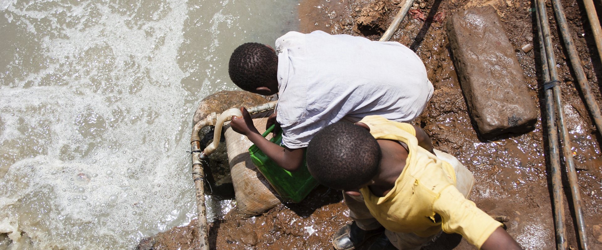 Men fetching water