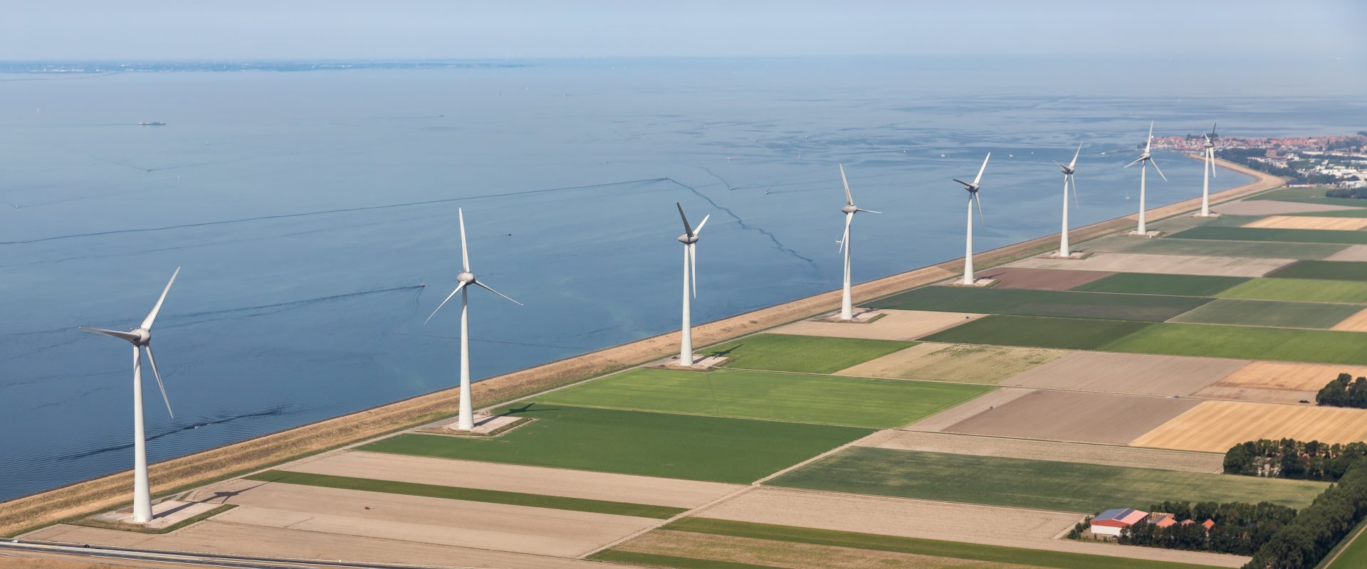 Dutch polder landscape with modern windmills
