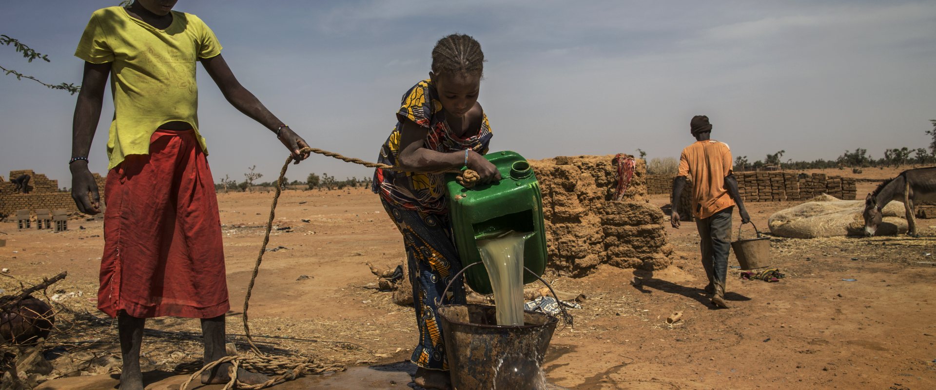 Fetching water from a pumping station.