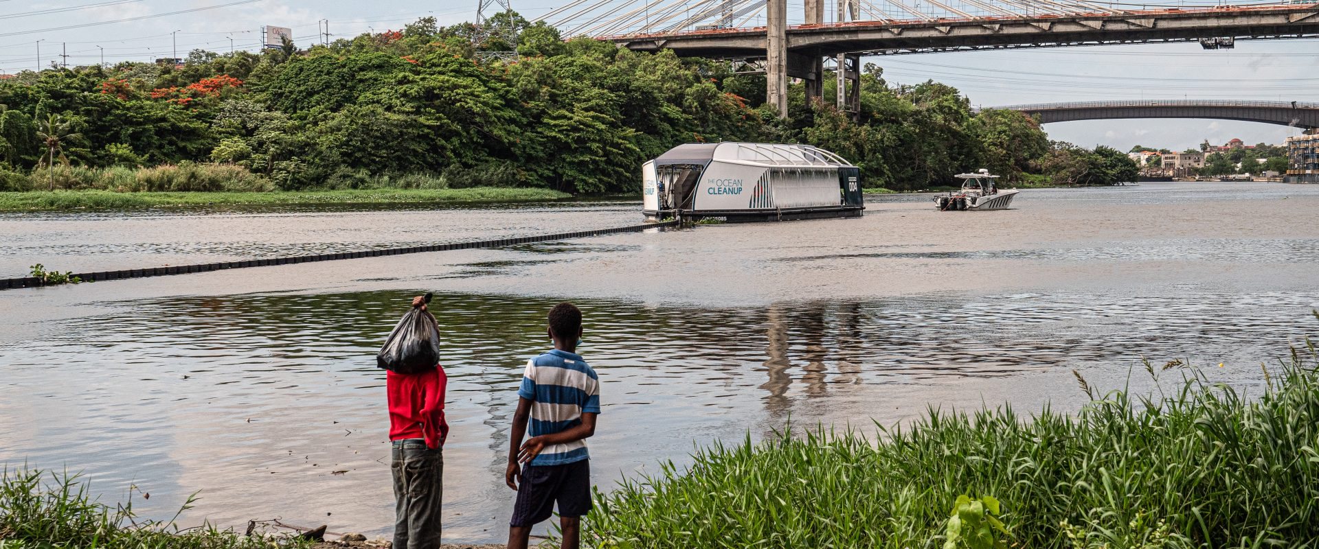 The Ocean Cleanup's Interceptor 004 collecting plastic waste on the Rio Ozama, Dominican Republic