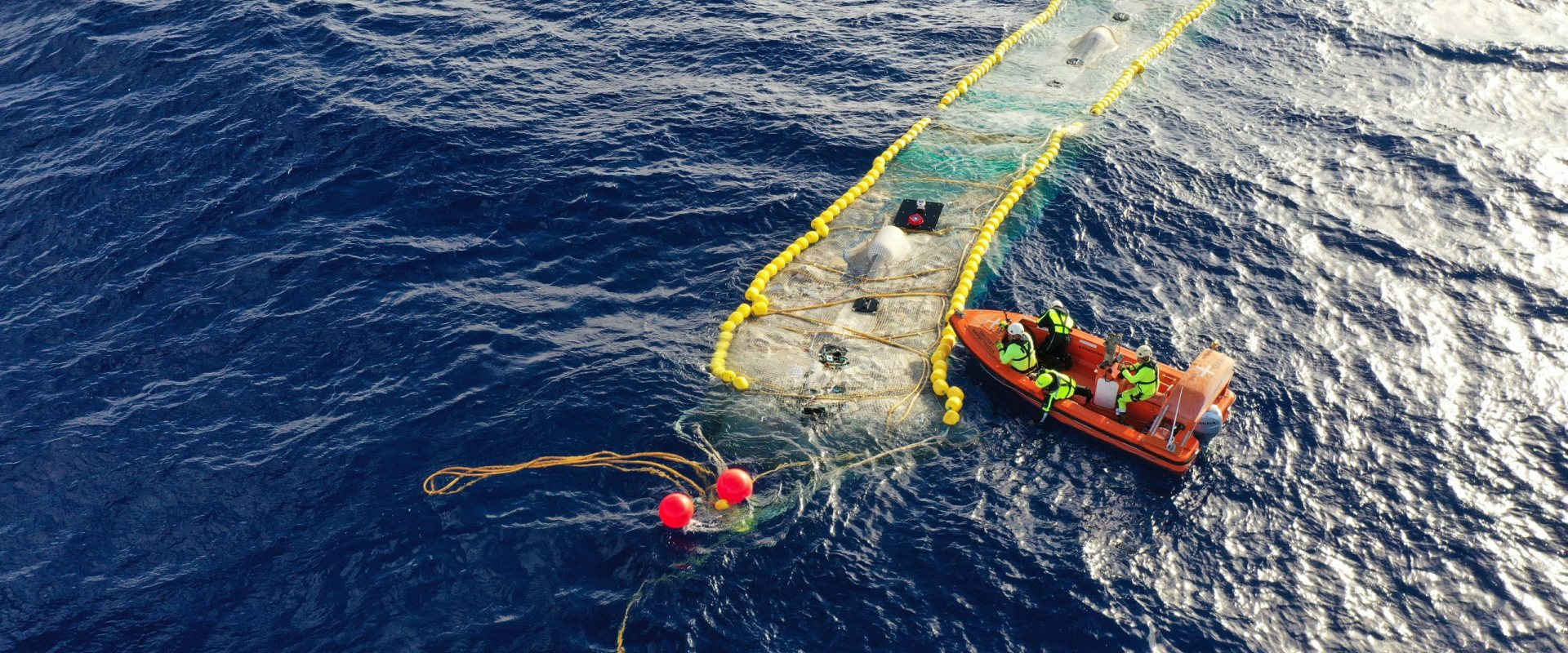 New garbage recovery system by The Ocean Cleanup deployed at sea.