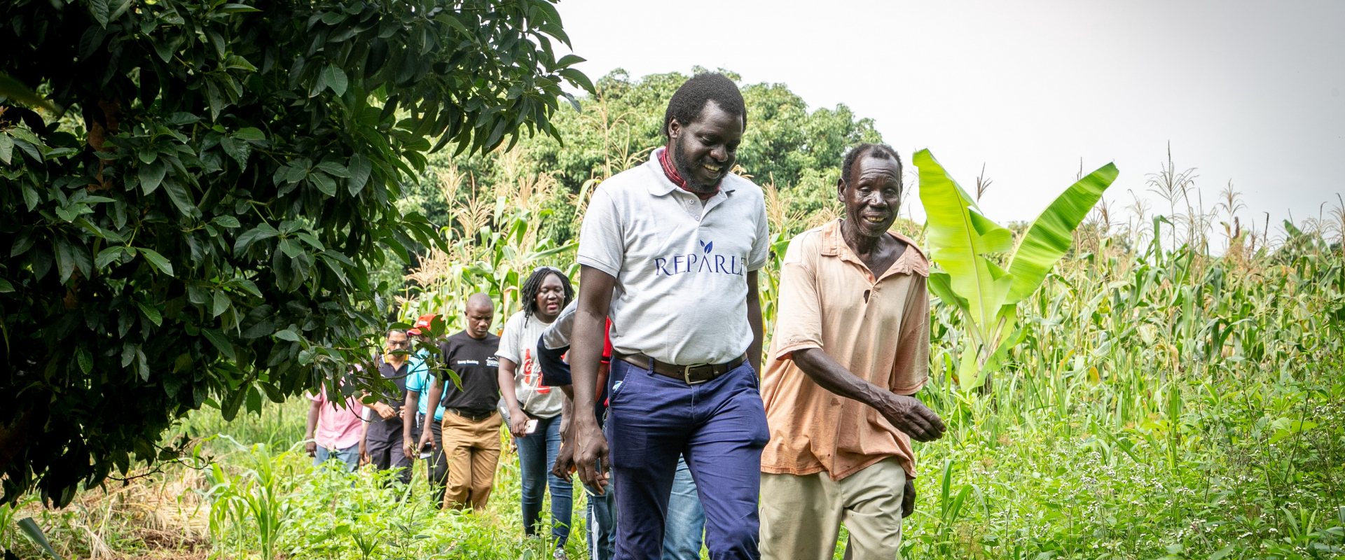 Kenyan entrepreneur Peter Nyeko with small hold farmers