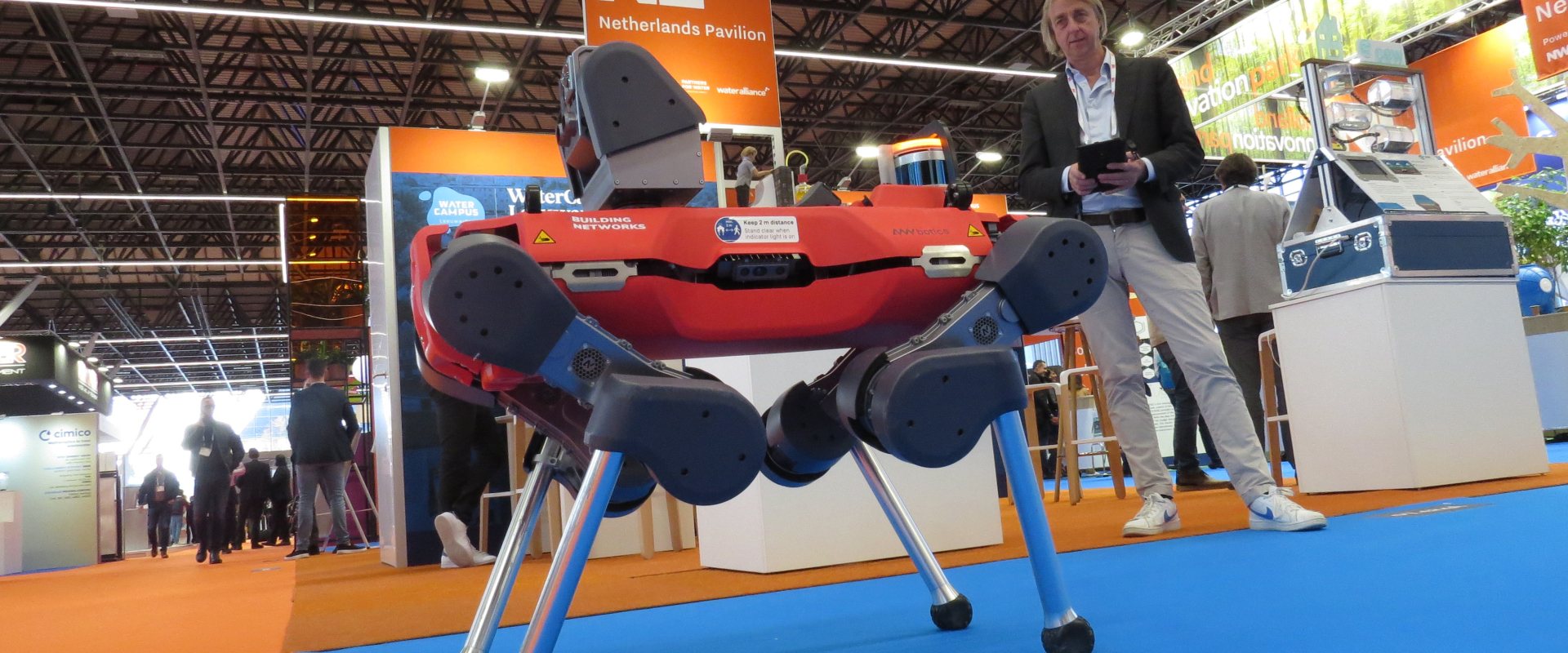 Quasset's four legged robotic unit walking around the Netherlands Pavilion at Aquatech Amsterdam 2023.