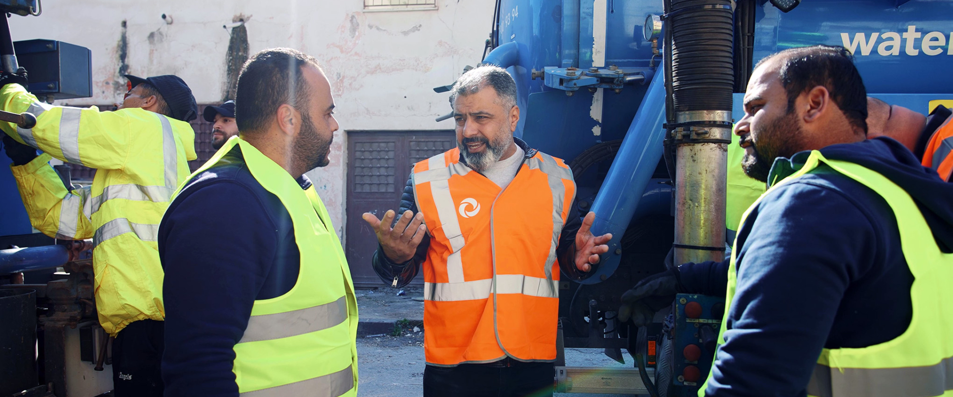 Employees of World Waternet and Yarmouk Water Company talking. Photo: World Waternet