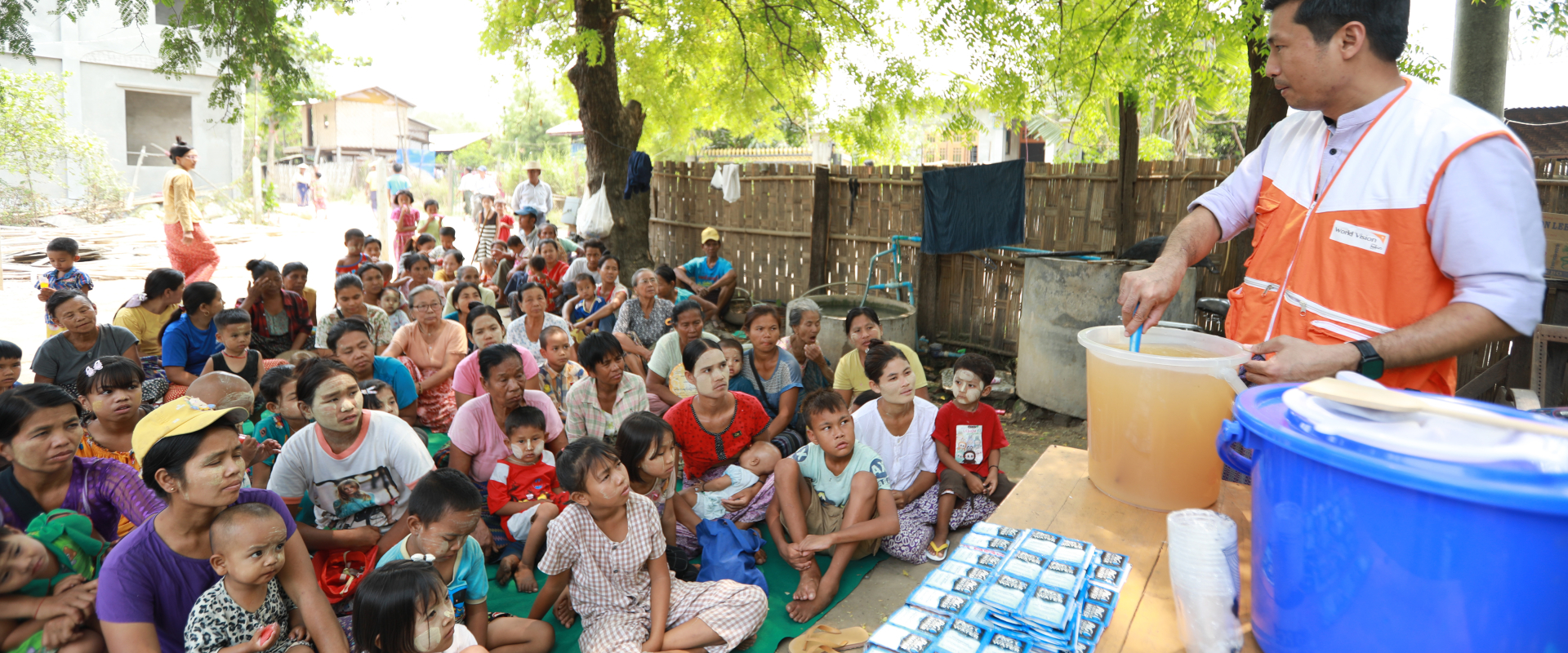 Distribution and demonstration of water purifier sachets in Myanmar. Photo: World Vision